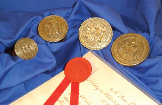 Seals used on old indentures of the Warden and Freemen of Malmesbury probably dating from 1696.